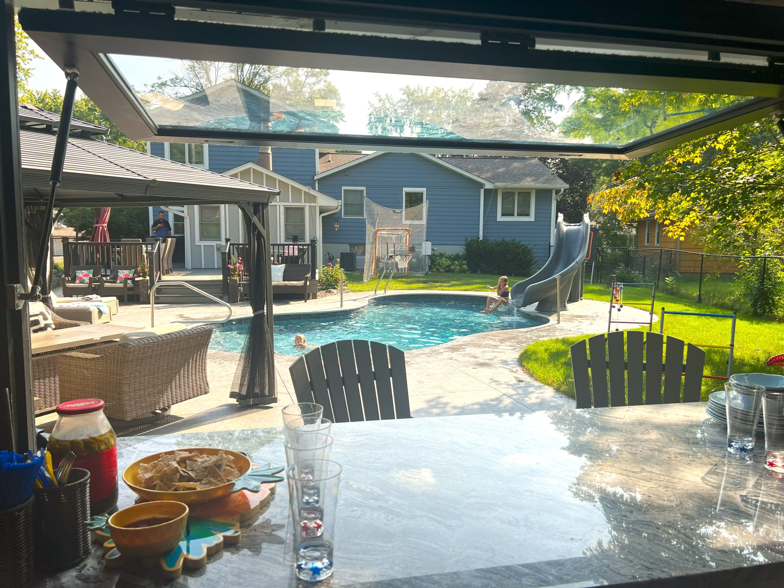 view of pool from inside strutter windwo