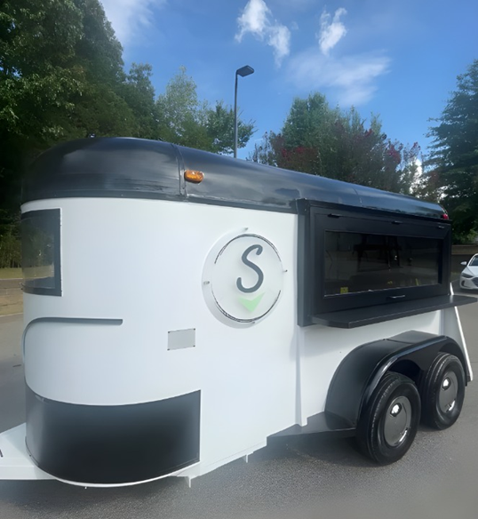 Picture of horse trailer converted into a mobile bar